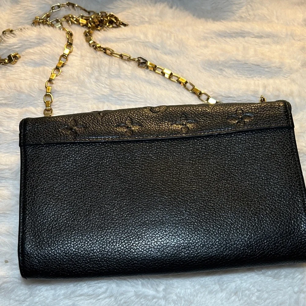337. Louis Vuitton Saint Germain Pochette in Black Monogram Empreinte leather